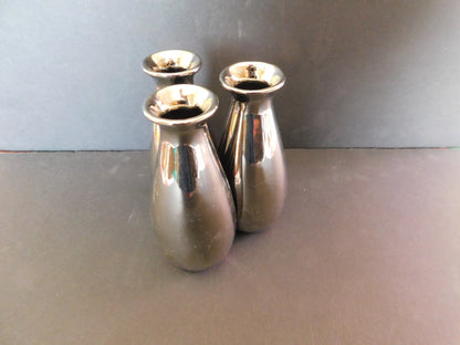 3 section chrome or stainless bud vase near mint condition