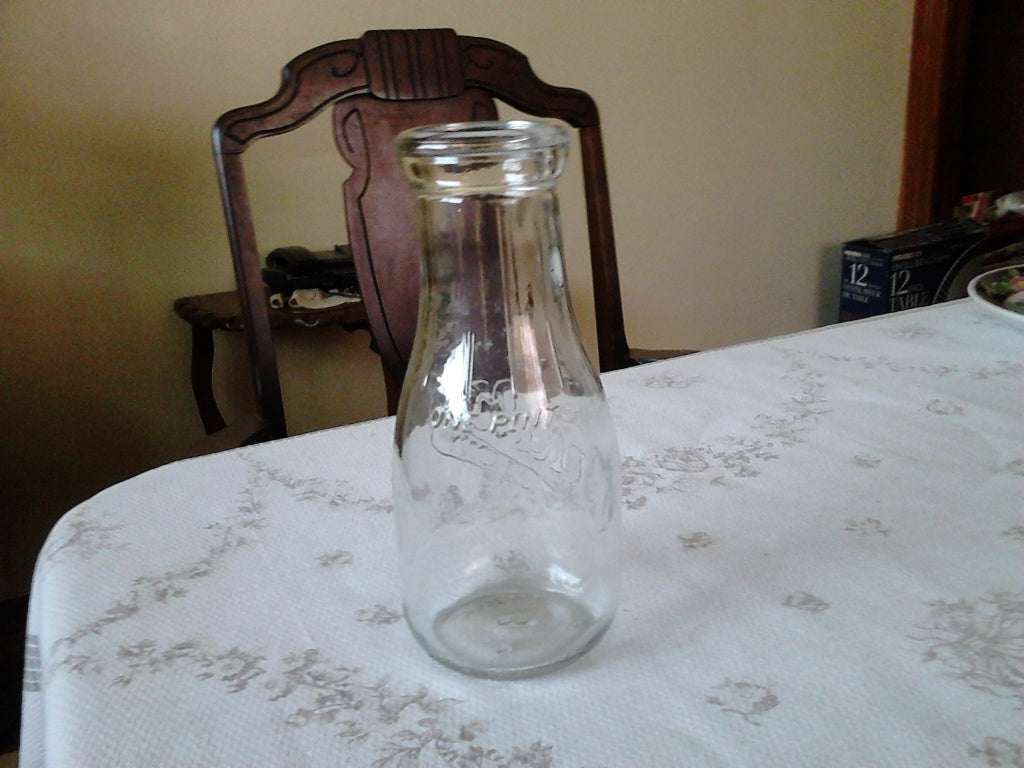 Embossed Weaver 1 pint milk bottle Carmel IN mint condition