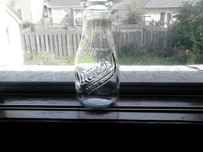 Embossed Weaver 1 pint milk bottle Carmel IN mint condition