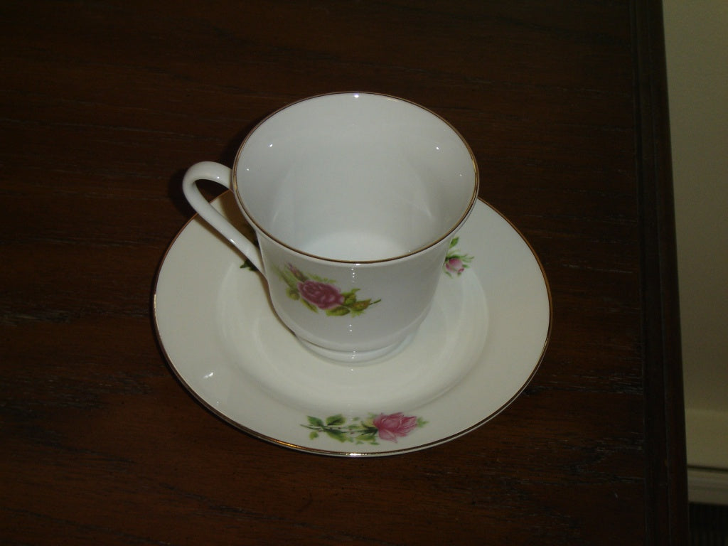 Porcelain pink red Rose cup and saucer mint condition