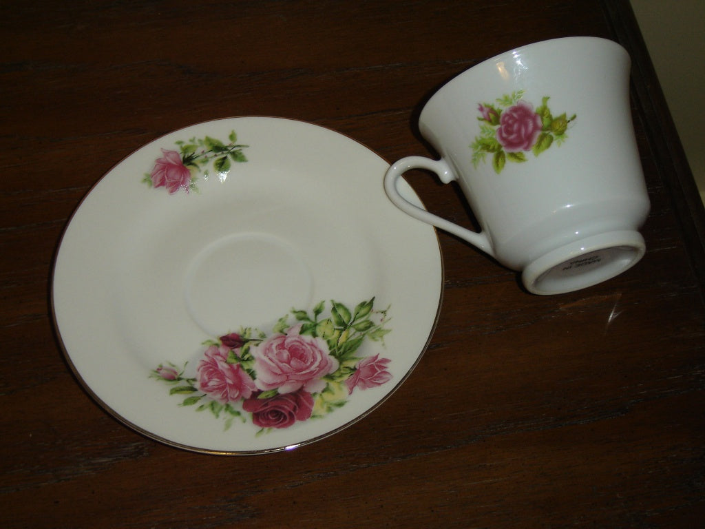 Porcelain pink red Rose cup and saucer mint condition