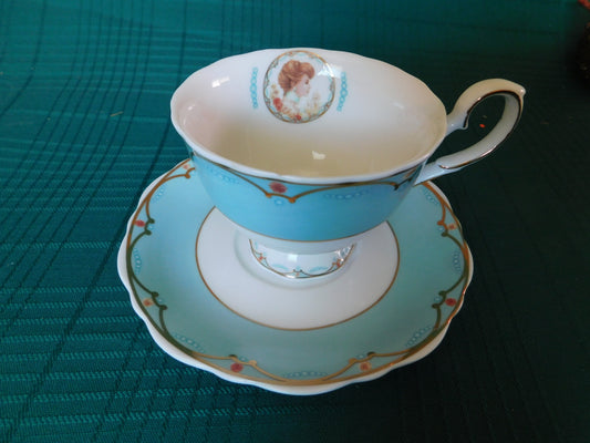 Avon Canada 2007-2008 blue band cameo girl cup and saucer