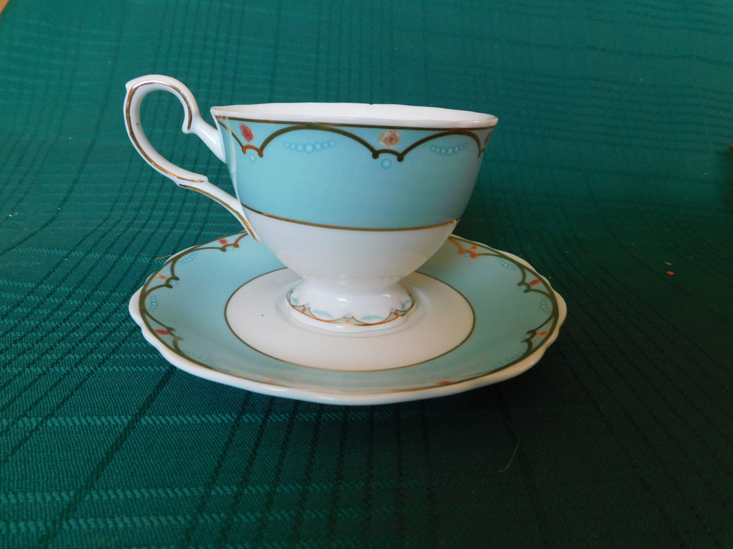 Avon Canada 2007-2008 blue band cameo girl cup and saucer