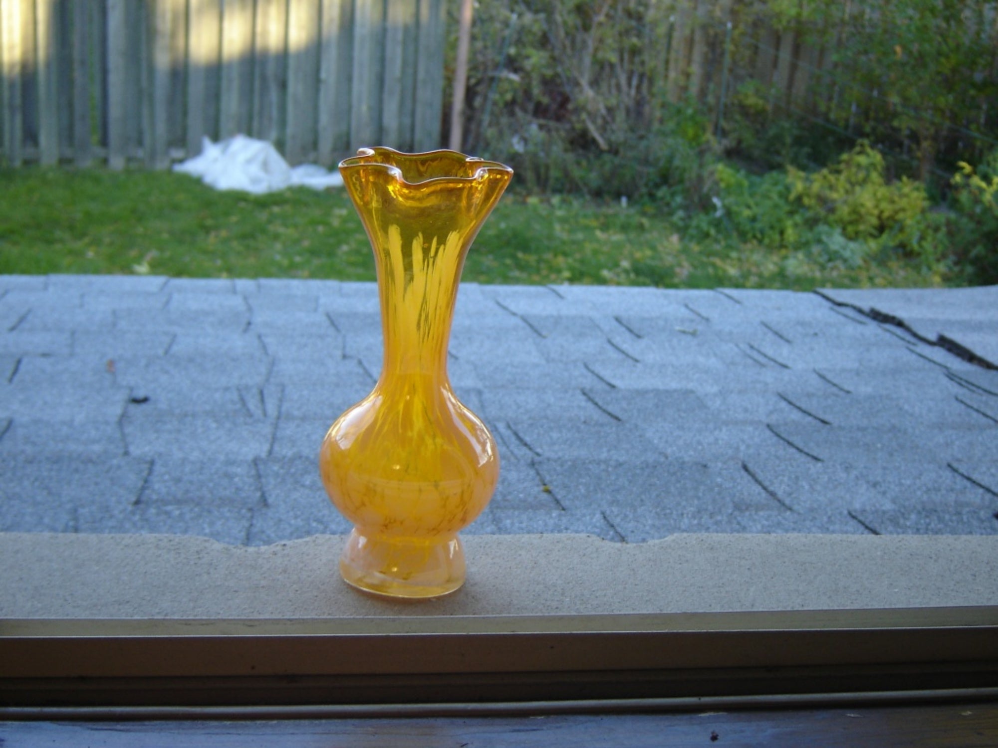 Handblown orange speckled art glass vase VGU