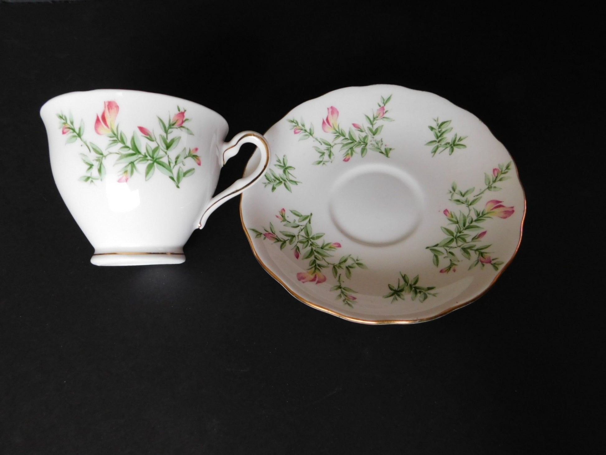 Colclough pink flower green leaves cup and saucer GUC - Items Tried And True