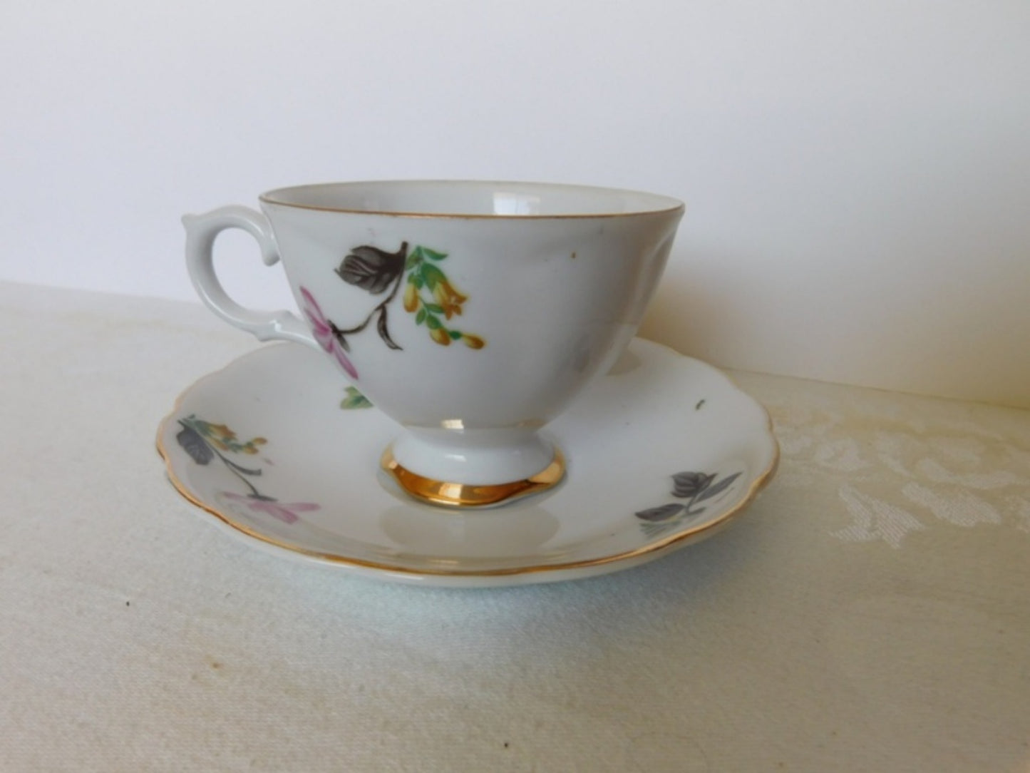 Trimont Japan pink yellow flower cup and saucer VGU