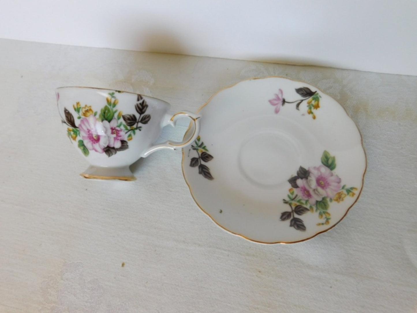 Trimont Japan pink yellow flower cup and saucer VGU