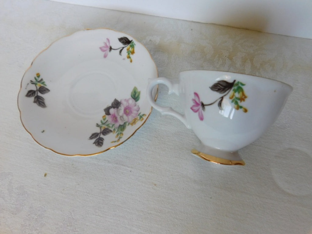 Trimont Japan pink yellow flower cup and saucer VGU