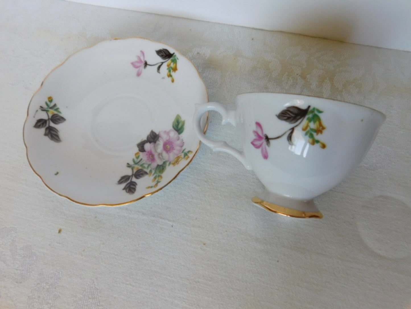 Trimont Japan pink yellow flower cup and saucer VGU