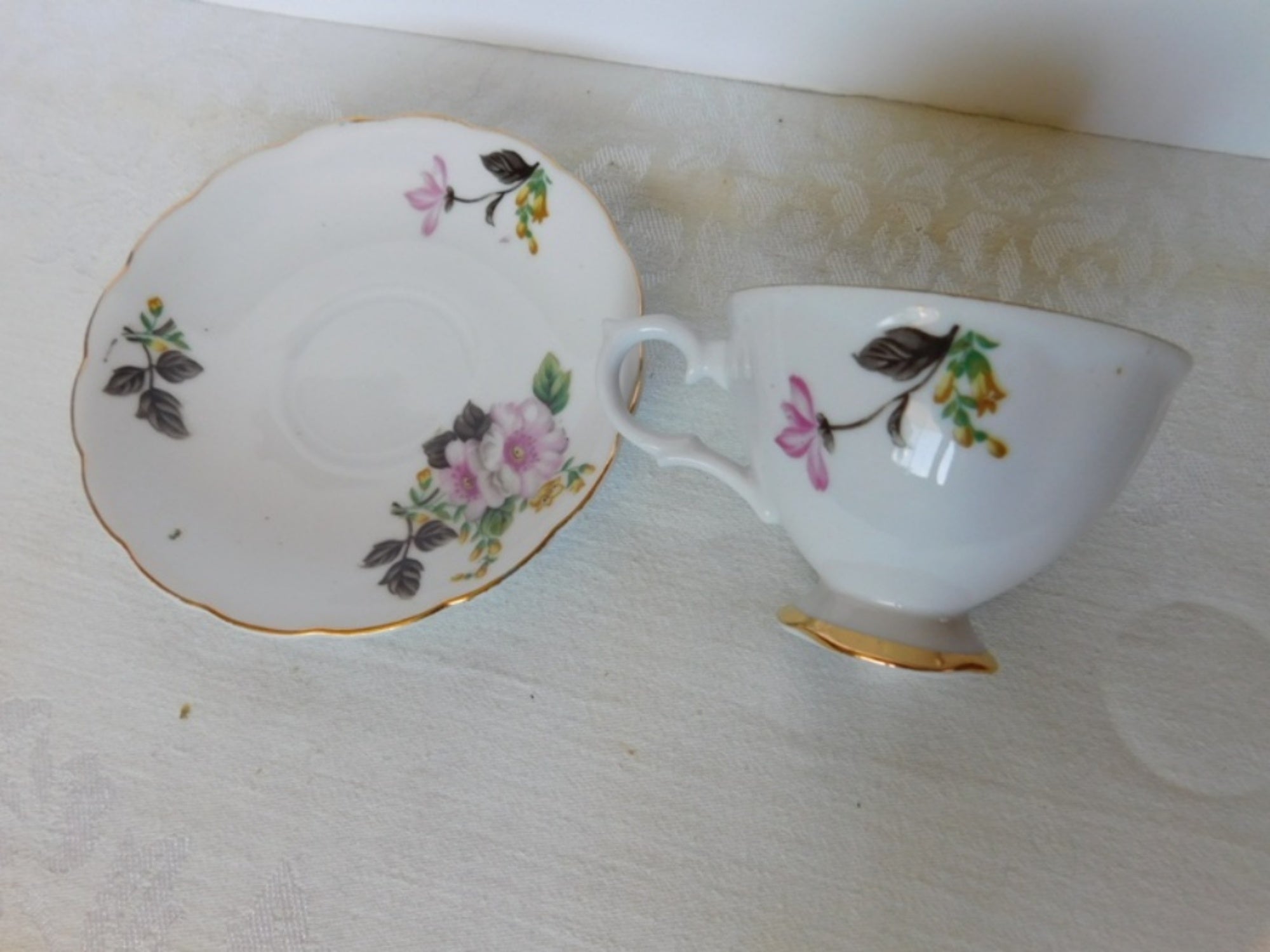 Trimont Japan pink yellow flower cup and saucer VGU