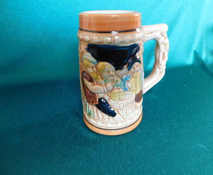 Ceramic beer stein three men