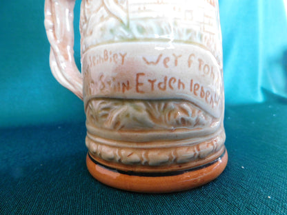 Ceramic beer stein three men