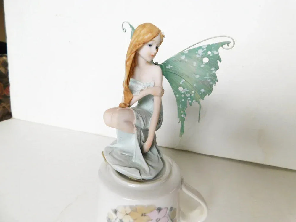 Elbygifts seated blue faerie