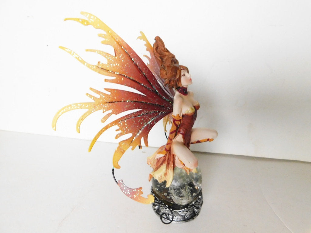 Seated brown faerie on crystal ball VGU - Items Tried And True