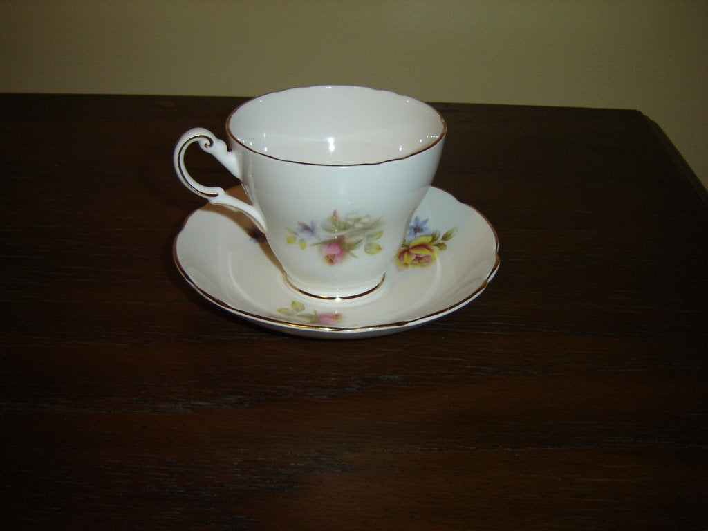 Regency pink yellow Rose cup and saucer VGU - Items Tried And True