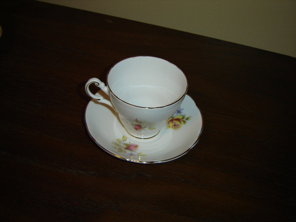 Regency pink yellow Rose cup and saucer VGU - Items Tried And True