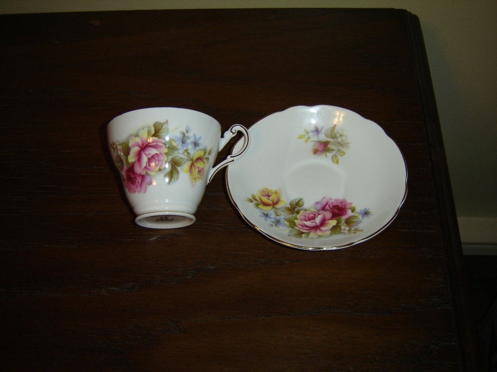 Regency pink yellow Rose cup and saucer VGU - Items Tried And True