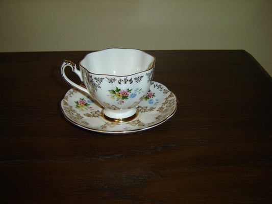 5886 multicolored bouquet gold floral cup and saucer VGU - Items Tried And True