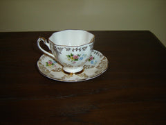 5886 multicolored bouquet gold floral cup and saucer VGU