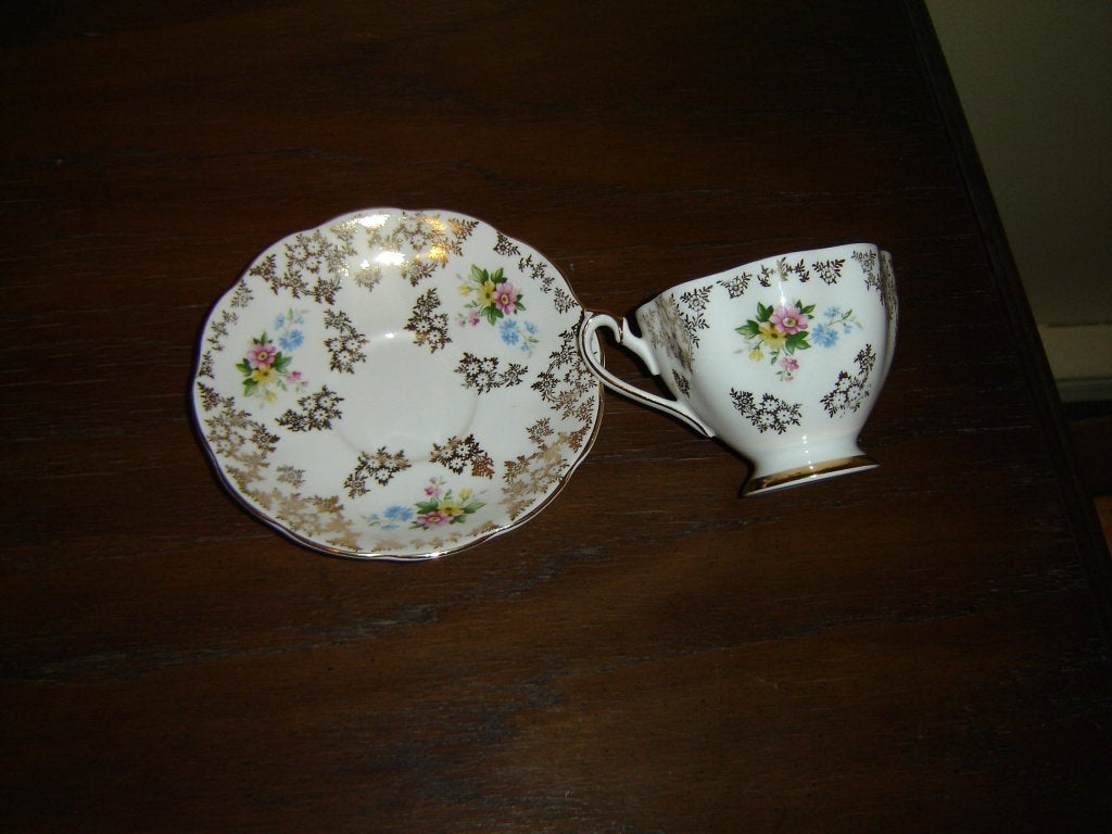 5886 multicolored bouquet gold floral cup and saucer VGU - Items Tried And True